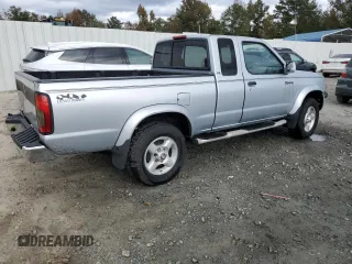 2000 Nissan Frontier XE with VIN 1N6ED26T0YC314102, listed as a Copart auction lot 83678264 with 174,419 mi miles and Salvage title. Bid and sale history available at DreamBid. Image 3.