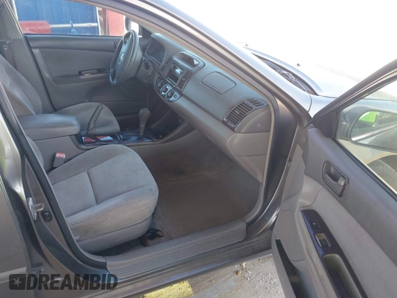 2004 Toyota Camry LE with VIN 4T1BE32KX4U916477, listed as a IAAI auction lot 42018299 with 149,247 mi miles. Bid and sale history available at carsss.com. Image 5.