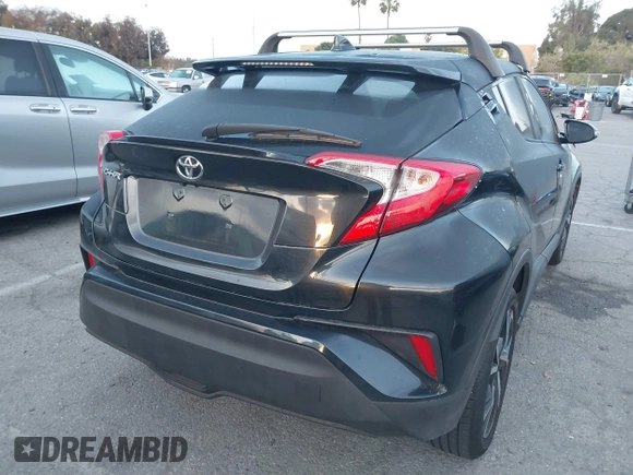2019 Toyota C-HR XLE with VIN JTNKHMBXXK1034717, listed as a IAAI auction lot 41939078 with 56,309 mi miles. Bid and sale history available at carsss.com. Image 4.