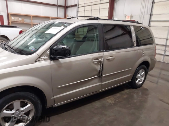 2009 Dodge Grand Caravan SXT z VIN 2D8HN541X9R652097, wystawiony jako IAAI lot #42370946 z przebiegiem 189 911 mil mil oraz . Historia ofert i sprzedaży dostępna na DreamBid. Obrazek 13.