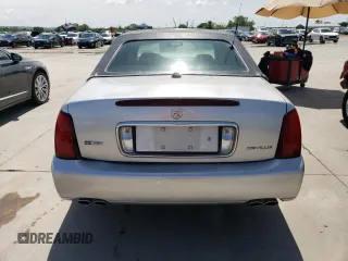2004 Cadillac DeVille z VIN 1G6KD54Y14U196655, wystawiony jako Copart lot #50882364 z przebiegiem 80 588 mil mil oraz Szkody całkowita. Historia ofert i sprzedaży dostępna na DreamBid. Obrazek 6.