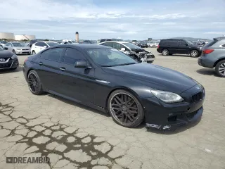 2015 BMW 6 Series 650i with VIN WBA6B2C59FGB99220, listed as a Copart auction lot 50026075 with 100,367 mi miles and Salvage Title. Bid and sale history available at carsss.com. Image 4.