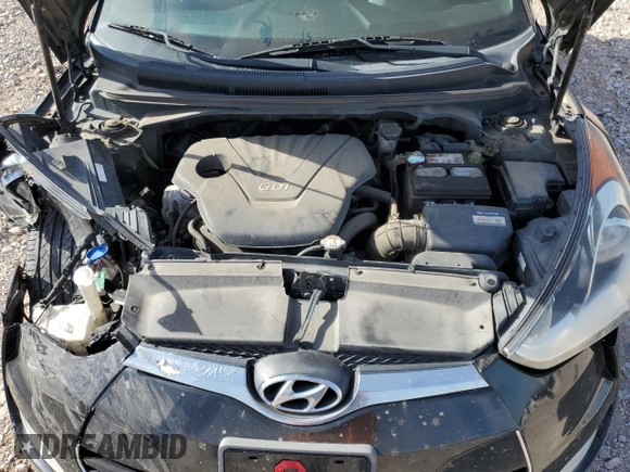 2016 Hyundai Veloster z VIN KMHTC6AD1GU293530, wystawiony jako Copart lot #53137985 z przebiegiem 151 003 mil mil oraz Szkody całkowita. Historia ofert i sprzedaży dostępna na DreamBid. Obrazek 13.