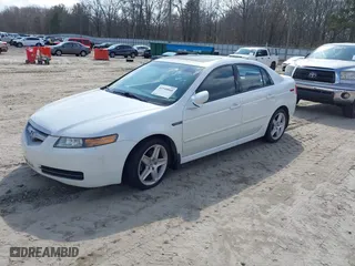 2006 Acura TL with VIN 19UUA66276A069590, listed as a IAAI auction lot 41540868 with 197,057 mi miles. Bid and sale history available at carsss.com. Image 2.