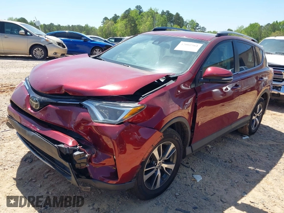 2018 Toyota RAV4 XLE with VIN 2T3WFREVXJW434957, listed as a IAAI auction lot 42002561 with 111,590 mi miles and . Bid and sale history available at carsss.com. Image 17.