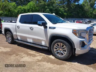 2020 GMC Sierra 1500 Denali with VIN 3GTU9FET3LG282311, listed as a IAAI auction lot 42067915 with 112,187 mi miles and . Bid and sale history available at DreamBid. Image 1.