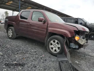 2007 Honda Ridgeline RTL z VIN 2HJYK16517H527441, wystawiony jako Copart lot #41366205 z przebiegiem 266 566 mil mil oraz Szkoda całkowita • Salvage title. Historia ofert i sprzedaży dostępna na DreamBid. Obrazek 4.