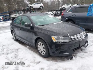 2014 Volkswagen Jetta Sedan S with VIN 3VW2K7AJ1EM217710, listed as a IAAI auction lot 41660771 with 73,680 mi miles. Bid and sale history available at carsss.com. Image 1.