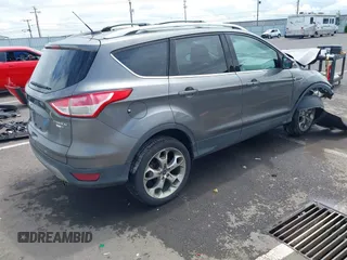 2013 Ford Escape Titanium with VIN 1FMCU9J95DUC95061, listed as a IAAI auction lot 42293047 with 124,641 mi miles and . Bid and sale history available at DreamBid. Image 4.
