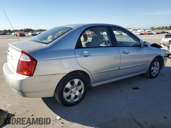2006 Kia Spectra EX with VIN KNAFE121965372856, listed as a Copart auction lot 77365514 with 316,947 mi miles and Clean Title. Bid and sale history available at carsss.com. Image 3.