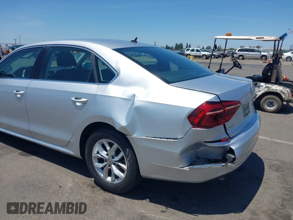 2017 Volkswagen Passat S with VIN 1VWAT7A32HC009657, listed as a IAAI auction lot 42541472 with 100,026 mi miles and . Bid and sale history available at DreamBid. Image 6.