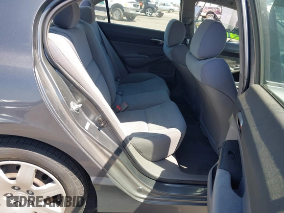 2009 Honda Civic LX z VIN 2HGFA16569H302404, wystawiony jako IAAI lot #42348074 z przebiegiem 157 897 mil mil oraz . Historia ofert i sprzedaży dostępna na DreamBid. Obrazek 8.
