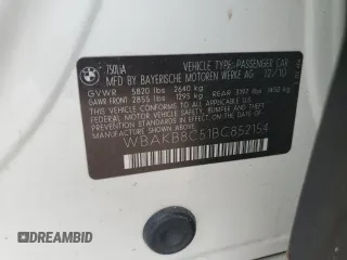 2011 BMW 7 Series 750Li with VIN WBAKB8C51BC852154, listed as a Copart auction lot 51530235 with 109,691 mi miles and Salvage Title. Bid and sale history available at carsss.com. Image 12.