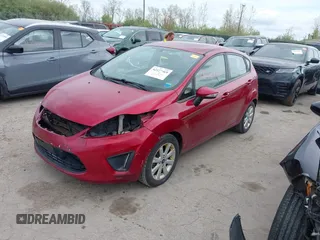 2013 Ford Fiesta SE with VIN 3FADP4EJXDM152463, listed as a IAAI auction lot 42122969 with 66,952 mi miles and . Bid and sale history available at DreamBid. Image 18.