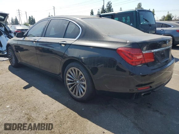 2012 BMW 7 Series 740i with VIN WBAKA4C59CDS99437, listed as a Copart auction lot 73795104 with 120,199 mi miles and Clean Title. Bid and sale history available at carsss.com. Image 2.