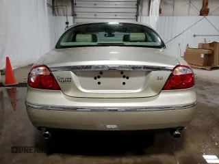 2006 Jaguar S-Type 3 z VIN SAJWA01A96FN53736, wystawiony jako Copart lot #52300005 z przebiegiem 68 472 mil mil oraz Szkody całkowita. Historia ofert i sprzedaży dostępna na DreamBid. Obrazek 6.