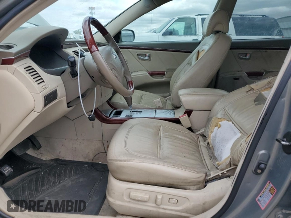 2006 Hyundai Azera SE z VIN KMHFC46F76A054625, wystawiony jako Copart lot #56588315 z przebiegiem 178 667 mil mil oraz Szkoda całkowita • Salvage title. Historia ofert i sprzedaży dostępna na DreamBid. Obrazek 7.