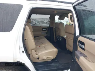 2016 Toyota Sequoia Limited with VIN 5TDJY5G18GS140071, listed as a IAAI auction lot 41570590 with 76,774 mi miles. Bid and sale history available at carsss.com. Image 8.