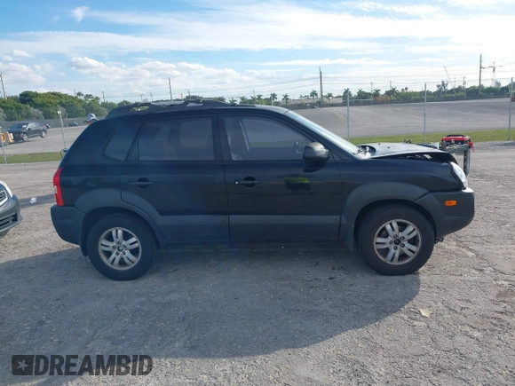 2007 Hyundai Tucson SE with VIN KM8JN12DX7U573823, listed as a IAAI auction lot 41238550 with 79,641 mi miles. Bid and sale history available at carsss.com. Image 13.