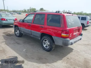 1996 Jeep Grand Cherokee Laredo with VIN 1J4FX58S4TC346218, listed as a IAAI auction lot 41943268 with 138,431 mi miles and . Bid and sale history available at DreamBid. Image 3.