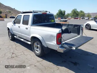 2000 Nissan Frontier XE z VIN 1N6ED27T5YC433357, wystawiony jako IAAI lot #42405160 z przebiegiem 290 620 mil mil oraz . Historia ofert i sprzedaży dostępna na DreamBid. Obrazek 3.