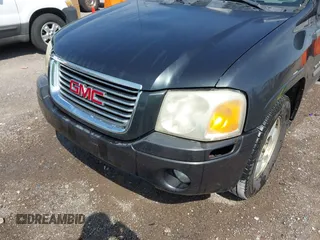 2006 GMC Envoy SLT with VIN 1GKDS13SX62247347, listed as a IAAI auction lot 42031142 with 263,599 mi miles. Bid and sale history available at carsss.com. Image 6.