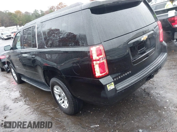 2019 Chevrolet Suburban LS with VIN 1GNSCGKC5KR321327, listed as a IAAI auction lot 41069977 with 282,308 mi miles and . Bid and sale history available at DreamBid. Image 3.