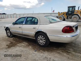 2001 Lincoln Continental with VIN 1LNHM97V01Y649261, listed as a Copart auction lot 44756395 with 141,648 mi miles and Salvage Title. Bid and sale history available at carsss.com. Image 2.