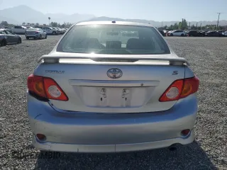 2010 Toyota Corolla z VIN 1NXBU4EE2AZ380585, wystawiony jako Copart lot #57024125 z przebiegiem 175 334 mil mil oraz Szkoda całkowita • Salvage title. Historia ofert i sprzedaży dostępna na DreamBid. Obrazek 6.