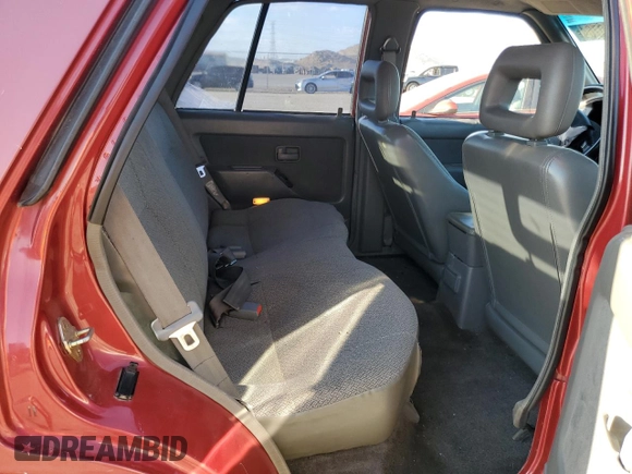 1997 Isuzu Rodeo z VIN 4S2CK58VXV4315798, wystawiony jako Copart lot #68860764 z przebiegiem 241 215 mil mil oraz Szkoda całkowita • Salvage title. Historia ofert i sprzedaży dostępna na DreamBid. Obrazek 11.