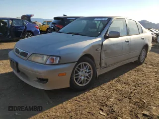 2001 Infiniti G20 Luxury z VIN JNKCP11A01T400404, wystawiony jako Copart lot #69899274 z przebiegiem 243 332 mil mil oraz Szkody całkowita. Historia ofert i sprzedaży dostępna na DreamBid. Obrazek 1.