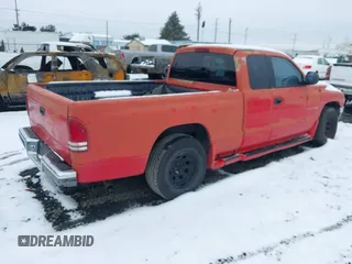 1997 Dodge Dakota with VIN 1B7GL23Y7VS134373, listed as a IAAI auction lot 41573554 with 201,659 mi miles. Bid and sale history available at carsss.com. Image 4.