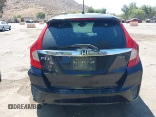 2015 Honda Fit EX-L z VIN 3HGGK5H88FM706513, wystawiony jako IAAI lot #42493772 z przebiegiem 173 129 mil mil oraz . Historia ofert i sprzedaży dostępna na DreamBid. Obrazek 17.