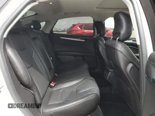 2014 Ford Fusion Titanium with VIN 3FA6P0K97ER393249, listed as a Copart auction lot 53087355 with 148,266 mi miles and Salvage Title. Bid and sale history available at DreamBid. Image 10.
