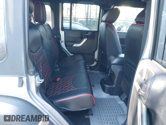 2015 Jeep Wrangler Unlimited Rubicon Hard Rock with VIN 1C4HJWFG1FL777222, listed as a IAAI auction lot 41843893 with 74,718 mi miles and . Bid and sale history available at DreamBid. Image 8.
