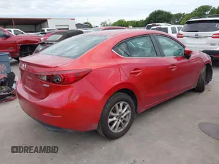 2015 Mazda 3 i Touring z VIN 3MZBM1V72FM171540, wystawiony jako IAAI lot #42437378 z przebiegiem 135 392 mil mil oraz . Historia ofert i sprzedaży dostępna na DreamBid. Obrazek 4.