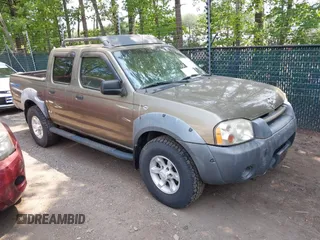 2001 Nissan Frontier XE z VIN 1N6ED27Y21C319821, wystawiony jako IAAI lot #42391286 z przebiegiem 79 389 mil mil oraz . Historia ofert i sprzedaży dostępna na DreamBid. Obrazek 1.