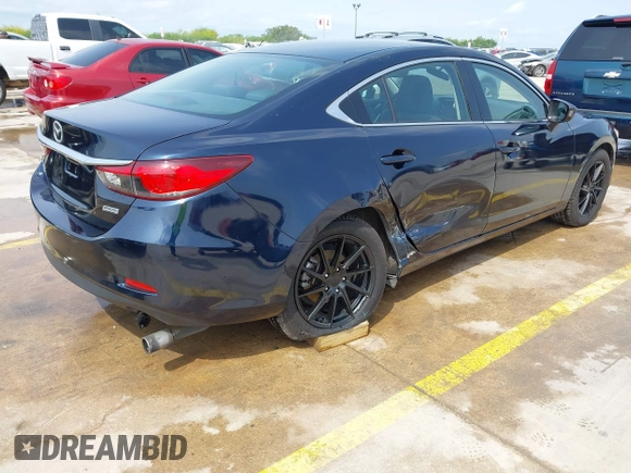 2015 Mazda 6 i Sport with VIN JM1GJ1U52F1201571, listed as a IAAI auction lot 42096344 with 88,290 mi miles and . Bid and sale history available at DreamBid. Image 4.