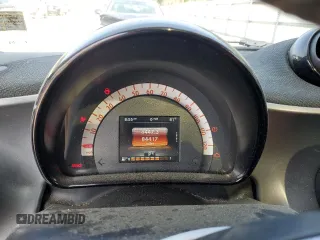 2016 Smart fortwo Passion с VIN WMEFJ5DA7GK066701, выставлен на аукционе Copart как лот 59093055 с пробегом 84 417 миль миль и Списание • Salvage title. История ставок и продаж доступна на DreamBid. Изображение 9.