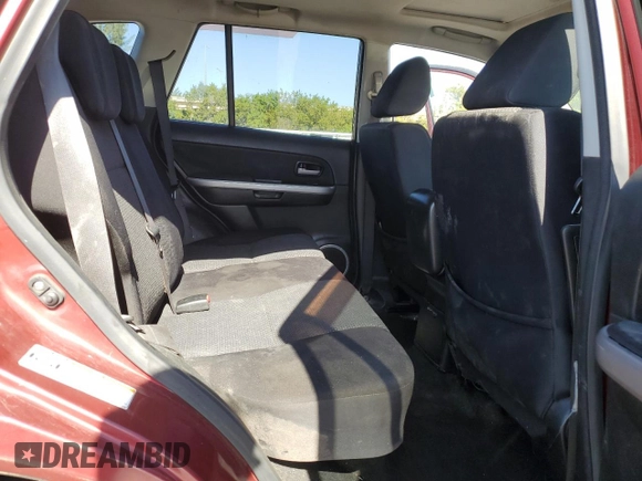 2007 Suzuki Grand Vitara XSport z VIN JS3TE944774204377, wystawiony jako Copart lot #87730295 z przebiegiem 114 051 mil mil oraz Szkoda całkowita • Salvage title. Historia ofert i sprzedaży dostępna na DreamBid. Obrazek 11.
