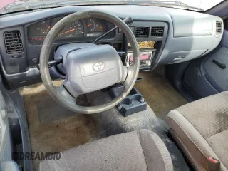 1998 Toyota Tacoma with VIN 4TANL42N8WZ022826, listed as a Copart auction lot 80758414 with 191,457 mi miles and Salvage Title. Bid and sale history available at carsss.com. Image 8.