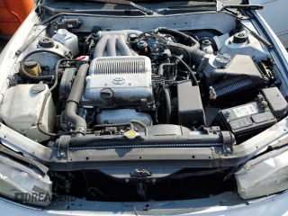 1992 Toyota Camry z VIN 4T1VK12E0NU015172, wystawiony jako Copart lot #58974095 z przebiegiem 210 163 mil mil oraz Szkoda całkowita • Salvage title. Historia ofert i sprzedaży dostępna na DreamBid. Obrazek 11.
