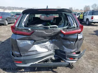 2020 Honda CR-V LX with VIN 2HKRW2H20LH607675, listed as a IAAI auction lot 41645896 with 64,973 mi miles. Bid and sale history available at carsss.com. Image 6.