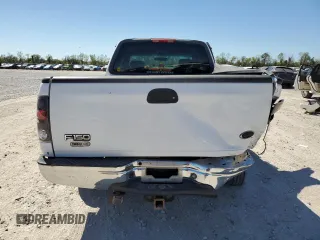 2002 Ford F-150 XL with VIN 1FTRX17W82NA64876, listed as a Copart auction lot 50013045 with 256,345 mi miles and Salvage Title. Bid and sale history available at carsss.com. Image 6.