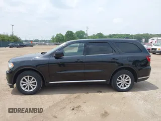 2015 Dodge Durango SXT with VIN 1C4RDJAG3FC161270, listed as a IAAI auction lot 42460444 with 112,633 mi miles and . Bid and sale history available at DreamBid. Image 14.