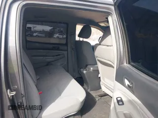 2015 Toyota Tacoma PreRunner z VIN 5TFJX4GN9FX039498, wystawiony jako IAAI lot #41487344 z przebiegiem 135 061 mil mil oraz . Historia ofert i sprzedaży dostępna na DreamBid. Obrazek 8.