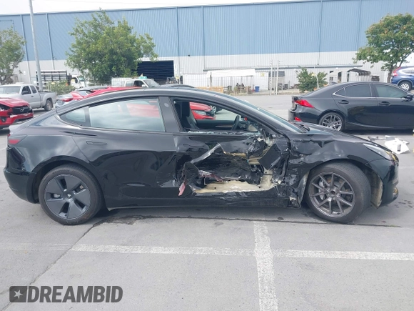 2023 Tesla Model 3 with VIN 5YJ3E1EA5PF647737, listed as a IAAI auction lot 42430145 with 20,525 mi miles and . Bid and sale history available at DreamBid. Image 13.