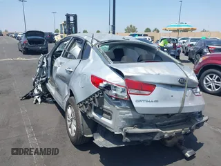 2017 Kia Optima LX z VIN KNAGT4L32H5157432, wystawiony jako IAAI lot #42154009 z przebiegiem 83 496 mil mil oraz . Historia ofert i sprzedaży dostępna na DreamBid. Obrazek 3.