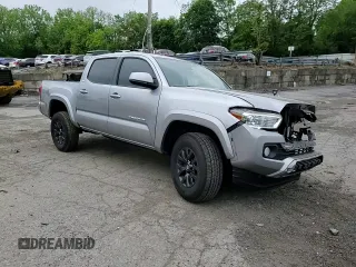 2021 Toyota Tacoma SR5 z VIN 3TYAZ5CN5MT004373, wystawiony jako Copart lot #58526145 z przebiegiem Nie podano mil oraz Szkoda całkowita • Salvage title. Historia ofert i sprzedaży dostępna na DreamBid. Obrazek 13.