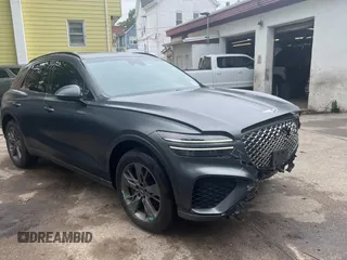 2022 Genesis GV70 Sport z VIN KMUMCDTC6NU028274, wystawiony jako Copart lot #61770155 z przebiegiem 46 523 mil mil oraz Szkoda całkowita • Salvage title. Historia ofert i sprzedaży dostępna na DreamBid. Obrazek 1.